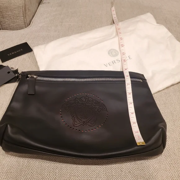 Brand new Versace leather clutch wrislet